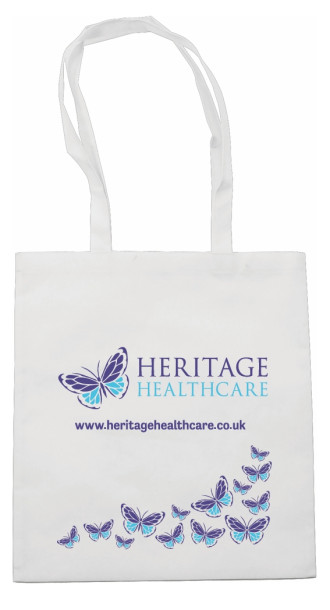 Nonwoven (80 gr/m2) carrying/shopping bag with long handles. Natural colour with Heritage logo