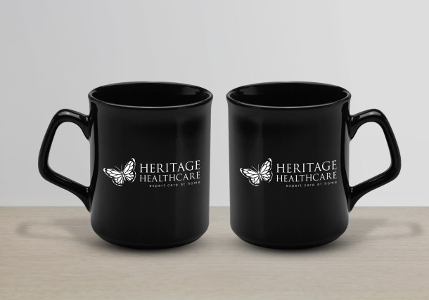 Black Sparta ceramic mug with Heritage Healthcare logo